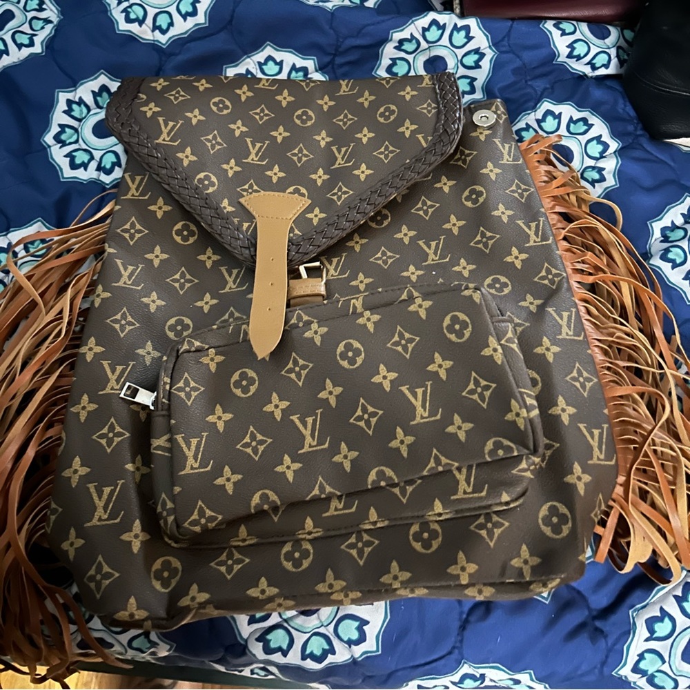 Backpack with fringe